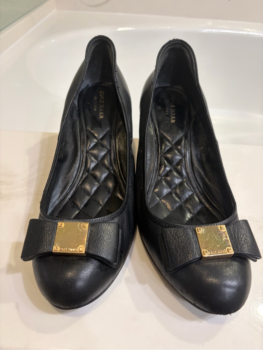 Cole Haan Black Leather Bow Wedges with Gold Square Accent